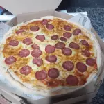 Pizza calabresa+ refri 1 litro