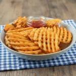 Porción de Papas Rejilla