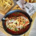 Pechuga a la parmesana