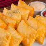 Porção de mini pastéis