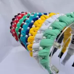 Diadema nudos infinitos con perlas