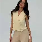 Chaleco asimetrico beige talla M y L