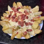 BATATA RUSTICA C/ QUEIJO E BACON