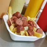 Picada de butifarra con papas
