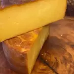 Parmesão defumado metade
