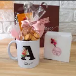 Caneca, café e biscoitos