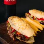 Promo vacio + 1 coca 1.75