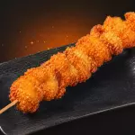 Espeto de frango empanado