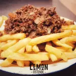 Papas Fritas con Bolognesa.