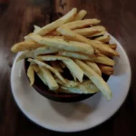 PAPAS FRITAS 1/2 PORCIÓN
