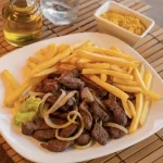 Trinchado de Maminha com baião
