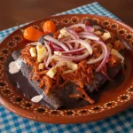 Enfrijoladas de cochinita