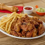 Frango à passarinho 1/2 porção