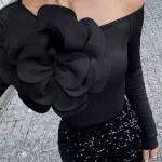 Blusa con mangas y flor negra