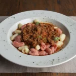 ÑOQUIS MIXTOS CON SALSA BOLOGNESA