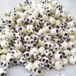 Separador calavera color hueso