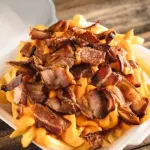 Porção.de fritas🍟 cm Bacon e chedda