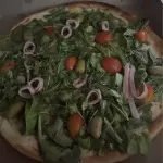 Pizza con rúcula
