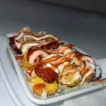 Salchipapa con papa criolla