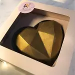 Coração lapidado dourado
