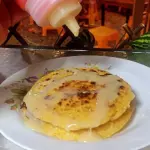 Arepa de choclo con lechecondensada