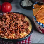 Fríjoles refritos con Pastor y Nacho