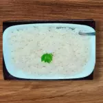 Porcao de arroz serve até 4 pessoas