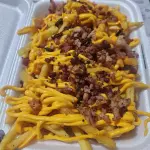 Porção Batata Cheddar e bacon 600Gr