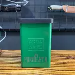 Porta erva com bico dosador
