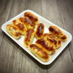 Enroladinho de pernil 10 unidades