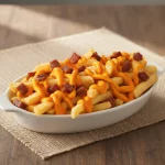 Batatinha (p) c/bacon e cheddar