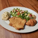 PECHUGA A LA PARMESANA