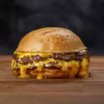 cheesburger doble + papas + gaseosa