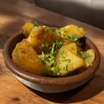 PAPAS SALTEADAS AL CILANTRO