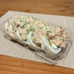 ROLLS ENVUELTO EN QUESO ACEVICHADO