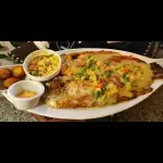 Trucha en salsa de verduras