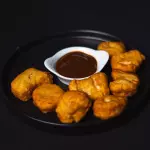 Nuggets com molho BBQ
