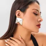 Aros forma de tacha plateado Inox.