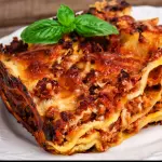 Lasanha da mama ao molho a bolonhesa