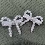 Broches  lazo