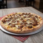 Pizza G 10 F de carne de sol na nata