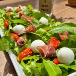 Salada com Parma, confit e burrata