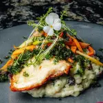 Trout crusted with roasted garlic