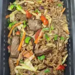 Salteado de Carne con arroz y vegeta