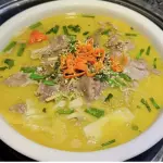 CALDO AGRIPICANTE CON TERNERA 酸汤肥牛