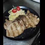 chuleta de cerdo con fettuccine