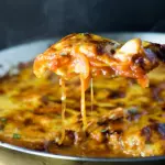 FILÉ PARMEGIANA DE PEIXE
