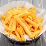 1/2 porción de papas fritas