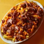 Fritas com cheddar e bacon