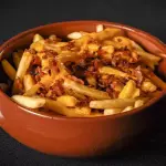 Papas cheddar y bacon